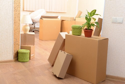 Boxes and furniture arranged to show cubic-yard load pricing options