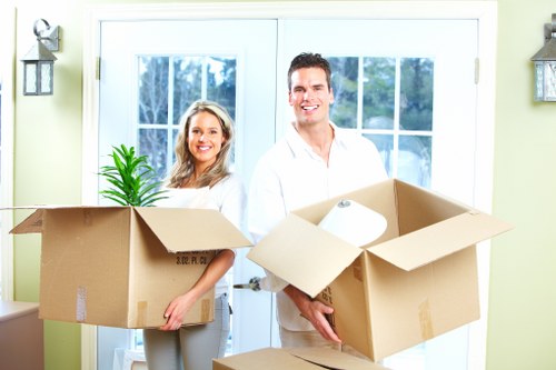A trained Blackfriars moving team handling furniture with care