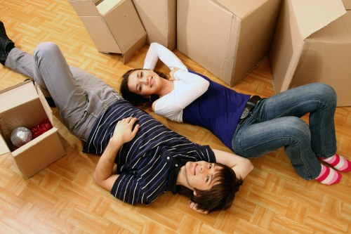 A risk-assessed moving operation in Blackfriars near a property entrance